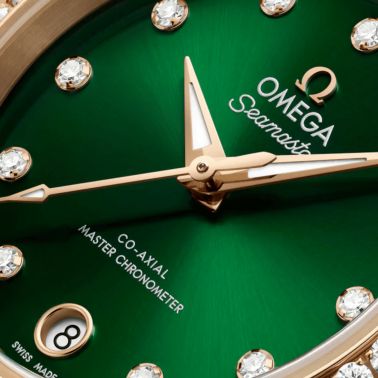 Montre Omega Seamaster Aqua Terra 150m automatique cadran vert bracelet or Moonshine 30 mm