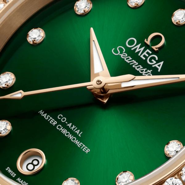 Montre Omega Seamaster Aqua Terra 150m automatique cadran vert bracelet or Moonshine 30 mm