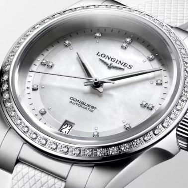 Montre Longines Conquest automatique diamants cadran nacre bracelet caoutchouc blanc 30 mm