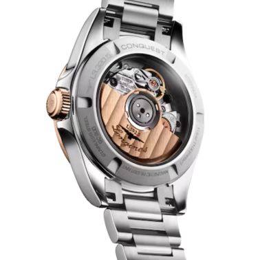 Montre Longines Conquest Or rose automatique cadran bleu bracelet caoutchouc acier 30 mm