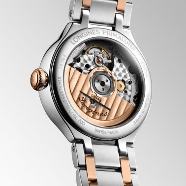 Longines PrimaLuna Moonphase automatic watch with white dial, diamond hour markers, and 34 mm steel and rose gold bracelet