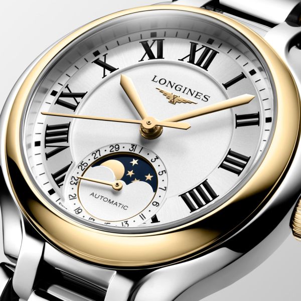 Longines PrimaLuna Moonphase automatic watch with white dial, diamond hour markers, steel and yellow gold bracelet, 34 mm