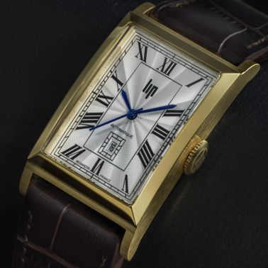 Montre Lip Churchill T26 automatique cadran argenté bracelet cuir marron 46 x 26 mm