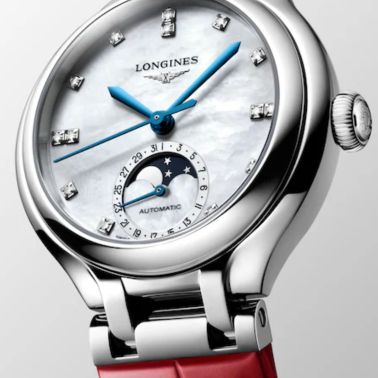 Longines PrimaLuna Moonphase automatic watch with white mother-of-pearl dial, diamond hour markers, and red leather strap, 34 mm