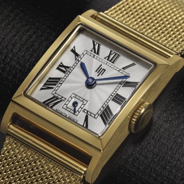 Montre Lip Churchill C18 Dorée quartz cadran argenté bracelet maille milanaise 21 x 21 mm