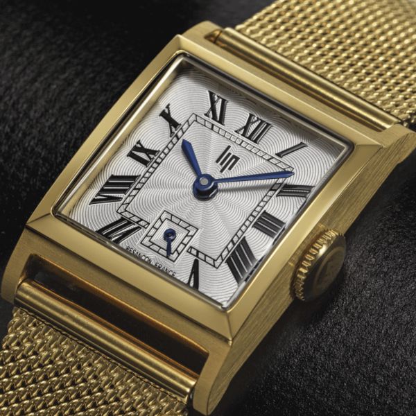 Montre Lip Churchill C18 Dorée quartz cadran argenté bracelet maille milanaise 21 x 21 mm