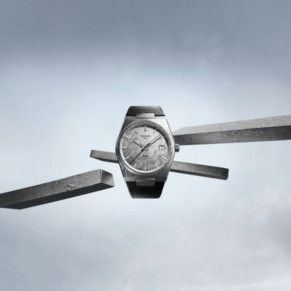 Montre Tissot PRX Damas Powermatic 80 cadran acier damas bracelet cuir 38 mm