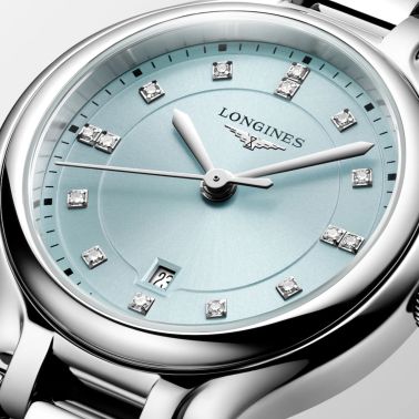 Longines PrimaLuna quartz watch with mint dial, diamond hour markers, and 30 mm steel bracelet