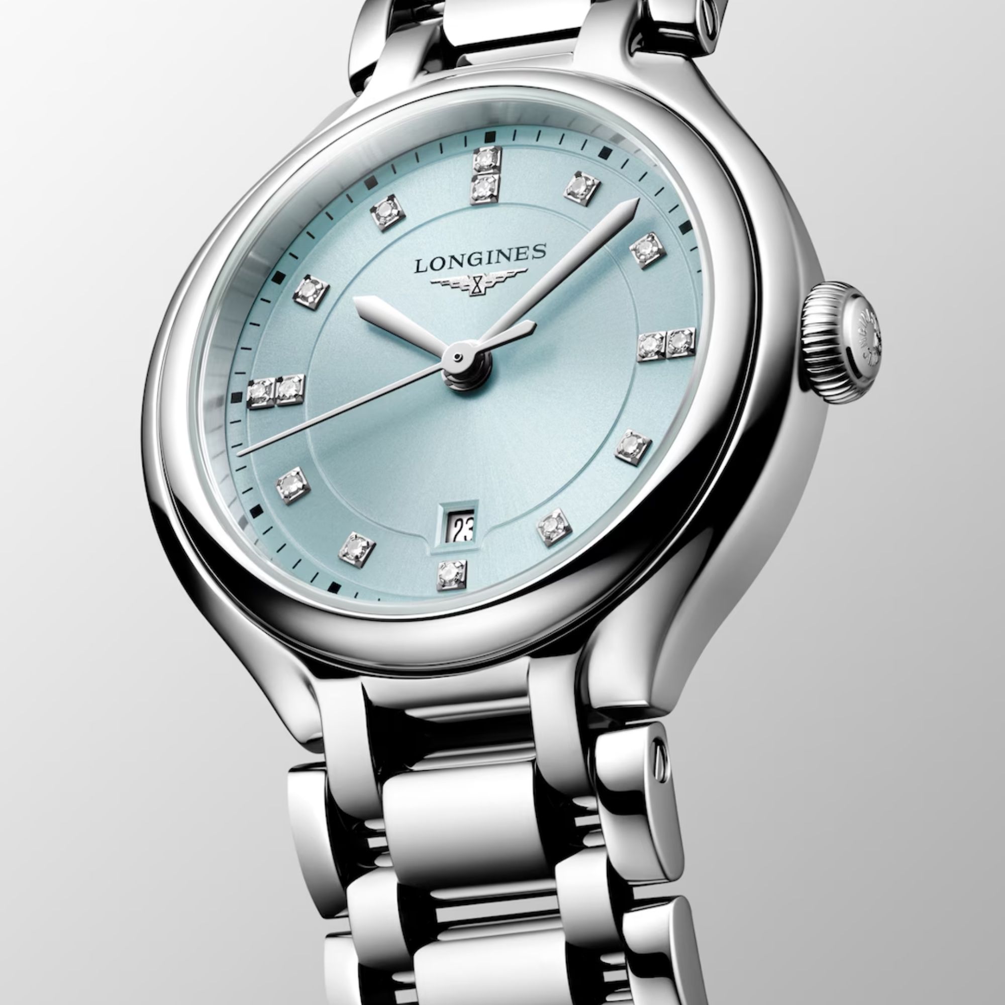 Longines PrimaLuna quartz watch with mint dial, diamond hour markers, and 30 mm steel bracelet
